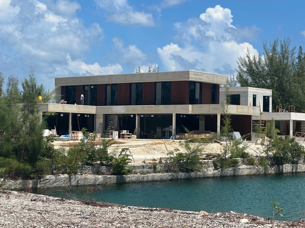 Coral Two · Lot 02 — View across the canal · Actual construction photograph