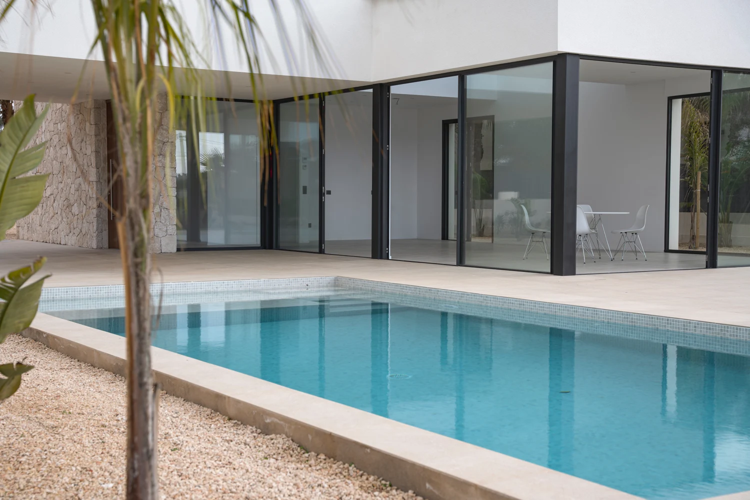 Mallorca · the pool terrace — Indoor–outdoor living. Actual photograph from Hanno Strack’s earlier portfolio.